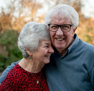 Senior couple reviewing Medicare insurance in Redlands, CA